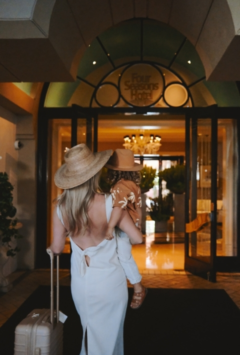 Checking in at the Four Seasons Hotel